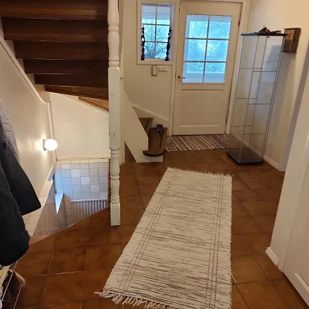 In A Wooden House With Garden *